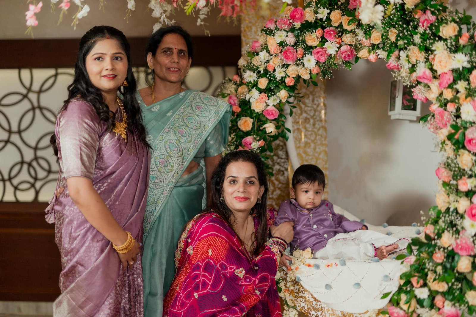 Vihaan Naming Ceremony family photo with mother and relatives captured